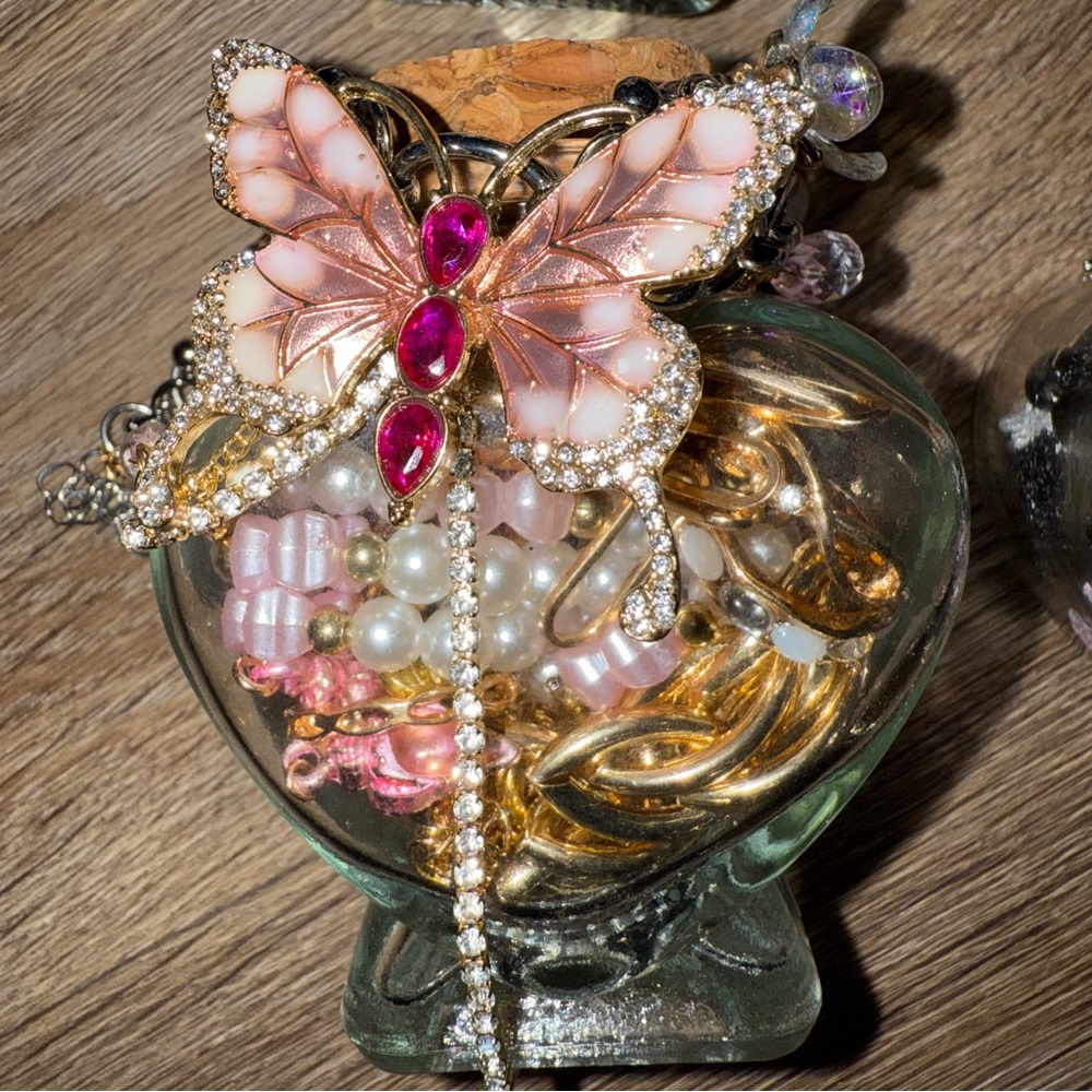 Elegant Pink Butterfly Brooch with Gold Accents